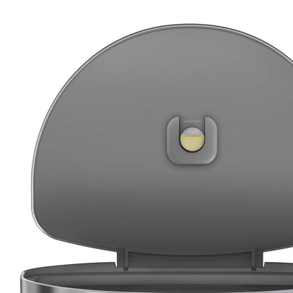 Detail view of Simplehuman 60L Semi-Round Step Can lid showing the built-in natural odor absorber pod.