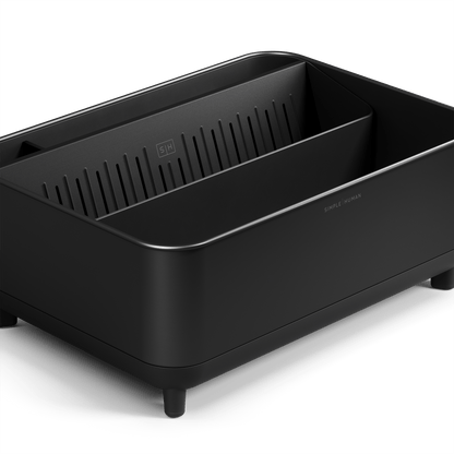 Close-up of Simplehuman Matte Black Bottle Dock showing interior drying tray and rack supports.