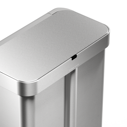 Detail view of Simplehuman Brushed Stainless Steel Sensor Recycler lid, highlighting the touch-free sensor.